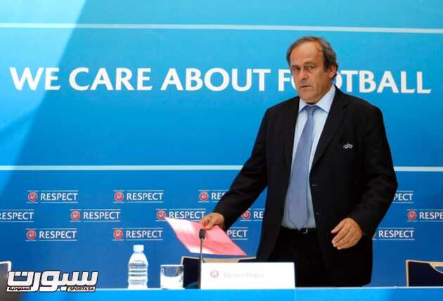 UEFA President Michel Platini arrives at a press conference after the soccer Europa League draw ceremony at the Grimaldi Forum, in Monaco, Friday, Aug. 28, 2015. (AP Photo/Claude Paris)