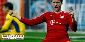 Thomas Mueller of Bayern Munich celebrates a goal against FC Basel during their Champions League round-of-16 second leg match in Munich March 13, 2012.   REUTERS/Michael Dalder(GERMANY - Tags: SPORT SOCCER)